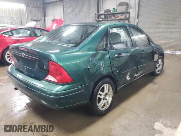 2000 Ford Focus SE with VIN 1FAFP3432YW312878, listed as a Copart auction lot 45812005 with 164,560 mi miles and Salvage Title. Bid and sale history available at carsss.com. Image 3.