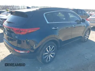 2018 Kia Sportage EX with VIN KNDPNCAC9J7324292, listed as a IAAI auction lot 41859338 with 124,519 mi miles and . Bid and sale history available at carsss.com. Image 4.