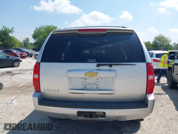 2013 Chevrolet Tahoe LS with VIN 1GNSCAE08DR153829, listed as a IAAI auction lot 42742266 with 216,821 mi miles and . Bid and sale history available at DreamBid. Image 16.