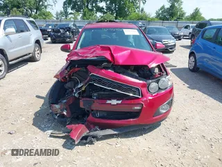 2012 Chevrolet Sonic LT with VIN 1G1JC6SH7C4135418, listed as a IAAI auction lot 42464564 with 169,035 mi miles and . Bid and sale history available at DreamBid. Image 13.