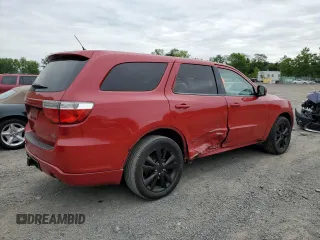 2013 Dodge Durango R/T with VIN 1C4SDJCTXDC688165, listed as a Copart auction lot 61071195 with 139,075 mi miles and Salvage title. Bid and sale history available at DreamBid. Image 3.