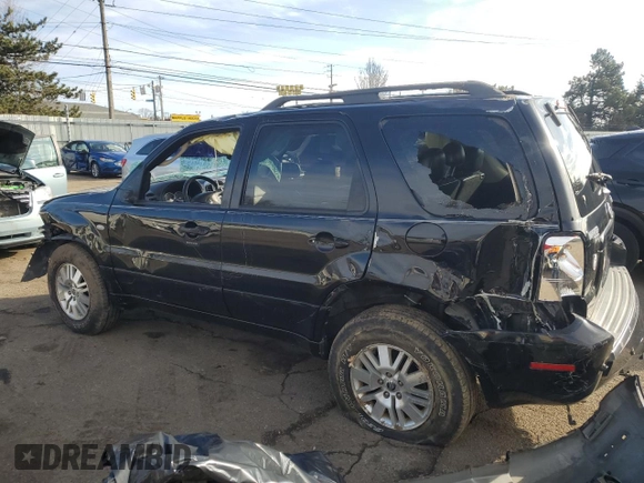 2005 Mercury Mariner Luxury z VIN 4M2CU57185DJ15517, wystawiony jako Copart lot #44415385 z przebiegiem 129 177 mil mil oraz Szkody całkowita. Historia ofert i sprzedaży dostępna na DreamBid. Obrazek 2.