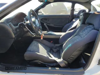 1994 Toyota MR2 z VIN JT2SW21M0R0021425, wystawiony jako Copart lot #83372474 z przebiegiem 233 885 mil mil oraz Szkoda całkowita • Salvage title. Historia ofert i sprzedaży dostępna na DreamBid. Obrazek 7.