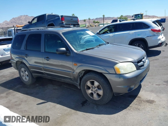 2003 Mazda Tribute ES with VIN 4F2CZ96113KM52877, listed as a IAAI auction lot 42217251 with 218,475 mi miles and . Bid and sale history available at DreamBid. Image 1.