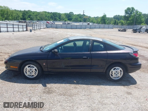 2000 Saturn SC with VIN 1G8ZR1275YZ113537, listed as a IAAI auction lot 42073307 with 276,289 mi miles and . Bid and sale history available at carsss.com. Image 14.