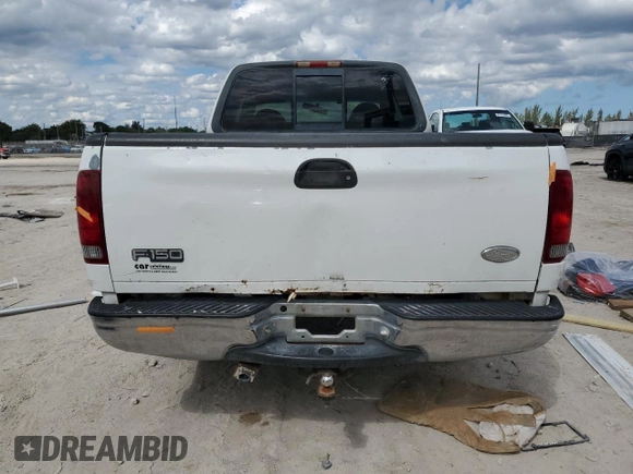 2000 Ford F-150 XL with VIN 1FTRX17L4YNA81687, listed as a Copart auction lot 46996675 with 0 mi miles and Salvage Title. Bid and sale history available at carsss.com. Image 6.