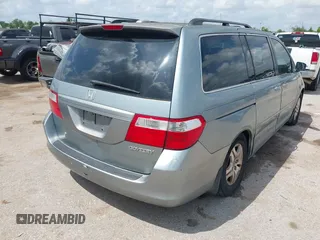 2005 Honda Odyssey EX-L with VIN 5FNRL38735B118506, listed as a IAAI auction lot 42101540 with 159,688 mi miles. Bid and sale history available at carsss.com. Image 4.