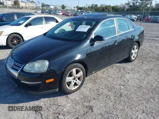 2008 Volkswagen Jetta Sedan SE with VIN 3VWRM71KX8M182235, listed as a IAAI auction lot 41519055 with 182,404 mi miles. Bid and sale history available at carsss.com. Image 2.