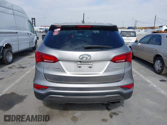 2018 Hyundai Santa Fe 2.4L with VIN 5NMZT3LB4JH069868, listed as a IAAI auction lot 42675555 with 142,612 mi miles and . Bid and sale history available at DreamBid. Image 16.