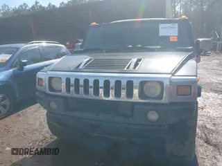 2003 Hummer H2 with VIN 5GRGN23U33H144379, listed as a IAAI auction lot 41452982 with 227,746 mi miles. Bid and sale history available at carsss.com. Image 12.