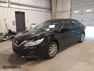 2016 Nissan Altima 2.5 SL with VIN 1N4AL3AP1GC151887, listed as a IAAI auction lot 41674852 with 142,741 mi miles. Bid and sale history available at carsss.com. Image 2.