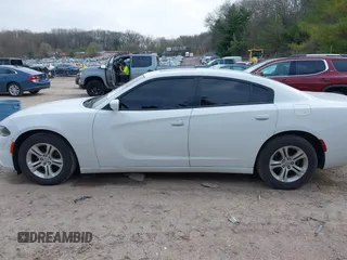 2020 Dodge Charger SXT z VIN 2C3CDXBG4LH213896, wystawiony jako IAAI lot #42143333 z przebiegiem 76 592 mil mil oraz . Historia ofert i sprzedaży dostępna na DreamBid. Obrazek 15.