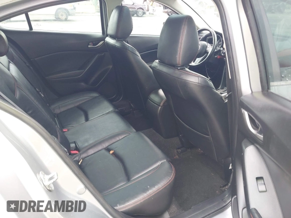 2014 Mazda 3 i Grand Touring with VIN JM1BM1M73E1216596, listed as a IAAI auction lot 41621165 with 127,235 mi miles and . Bid and sale history available at DreamBid. Image 8.