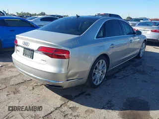 2015 Audi A8 3.0T with VIN WAU3GAFD5FN034341, listed as a IAAI auction lot 40892275 with 87,713 mi miles and . Bid and sale history available at DreamBid. Image 4.