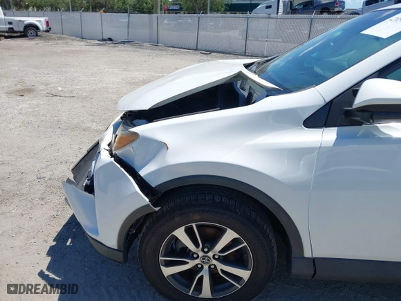 2017 Toyota RAV4 XLE with VIN 2T3RFREV1HW683851, listed as a IAAI auction lot 42051722 with 98,307 mi miles. Bid and sale history available at carsss.com. Image 17.