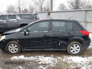 2009 Nissan Versa 1.8 SL with VIN 3N1BC13E49L427102, listed as a IAAI auction lot 41553357 with 133,300 mi miles. Bid and sale history available at carsss.com. Image 14.