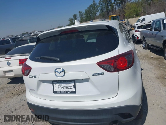 2013 Mazda CX-5 Touring with VIN JM3KE2CE0D0119032, listed as a IAAI auction lot 41891556 with 174,745 mi miles and . Bid and sale history available at carsss.com. Image 16.