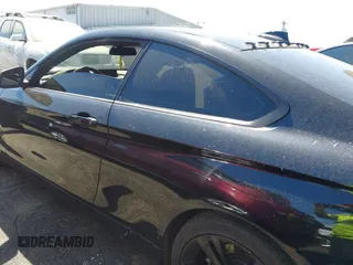 2015 BMW 4 Series 428i with VIN WBA3N7C54FK223490, listed as a IAAI auction lot 42033200 with 145,882 mi miles. Bid and sale history available at carsss.com. Image 14.