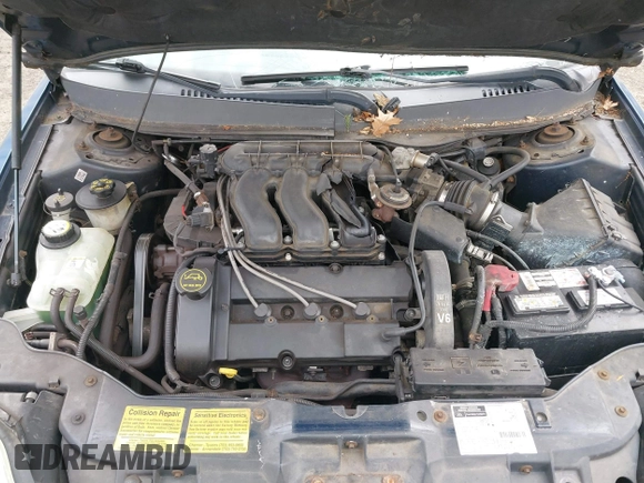 2002 Mercury Sable LS Premium with VIN 1MEHM59S02A614938, listed as a IAAI auction lot 41640570 with 86,549 mi miles and . Bid and sale history available at DreamBid. Image 10.
