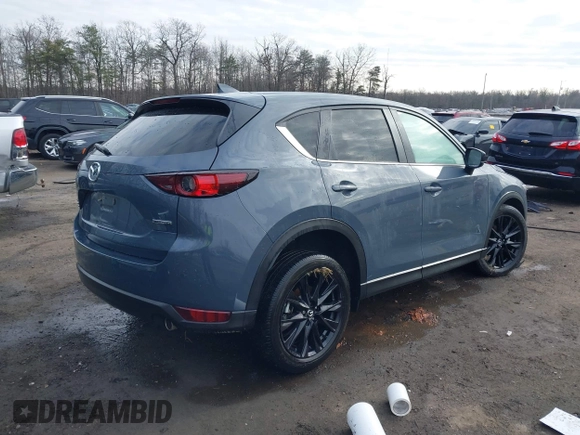 2021 Mazda CX-5 Touring with VIN JM3KFBCM5M0332644, listed as a IAAI auction lot 41083205 with 36,105 mi miles. Bid and sale history available at carsss.com. Image 4.