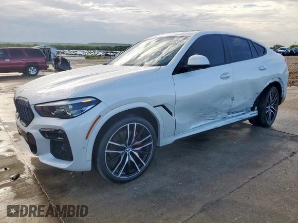 2023 BMW X6 xDrive40i z VIN 5UXCY6C08P9N43749, wystawiony jako Copart lot #54092795 z przebiegiem 39 495 mil mil oraz Szkody całkowita. Historia ofert i sprzedaży dostępna na DreamBid. Obrazek 1.