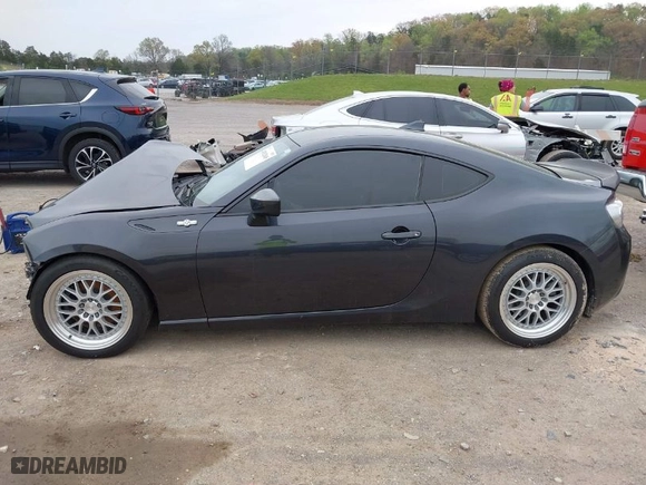 2015 Scion FR-S with VIN JF1ZNAA10F9701637, listed as a IAAI auction lot 41912045 with 1 mi miles. Bid and sale history available at carsss.com. Image 14.