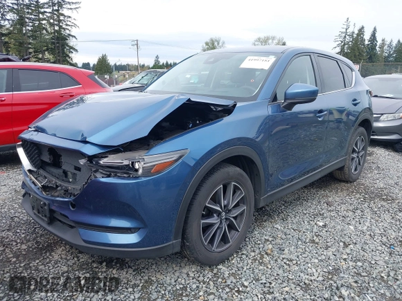 2017 Mazda CX-5 Grand Touring with VIN JM3KFADL5H0100146, listed as a IAAI auction lot 41997181 with 80,071 mi miles. Bid and sale history available at carsss.com. Image 17.