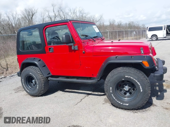 2002 Jeep Wrangler X with VIN 1J4FA39S02P739211, listed as a IAAI auction lot 41665910 with 144,118 mi miles. Bid and sale history available at carsss.com. Image 13.