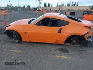 2011 Nissan 370Z Touring z VIN JN1AZ4EH6BM554805, wystawiony jako IAAI lot #41271462 z przebiegiem Nie podano mil oraz . Historia ofert i sprzedaży dostępna na DreamBid. Obrazek 14.