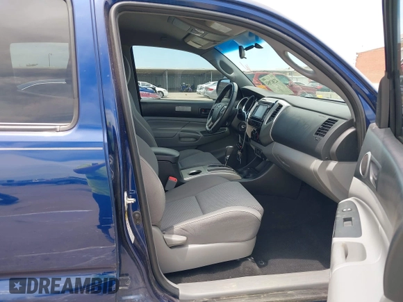 2014 Toyota Tacoma with VIN 3TMLU4EN6EM148851, listed as a IAAI auction lot 42307954 with 71,784 mi miles and . Bid and sale history available at DreamBid. Image 5.