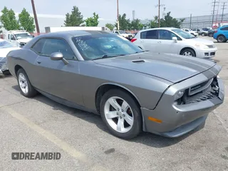 2012 Dodge Challenger SXT Plus z VIN 2C3CDYAGXCH280879, wystawiony jako IAAI lot #42421578 z przebiegiem 64 359 mil mil oraz . Historia ofert i sprzedaży dostępna na DreamBid. Obrazek 1.
