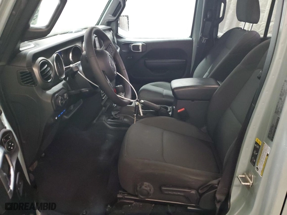 2023 Jeep Wrangler 4xe with VIN 1C4JJXN64PW690401, listed as a Copart auction lot 88318545 with 22,314 mi miles and Salvage Title. Bid and sale history available at carsss.com. Image 7.