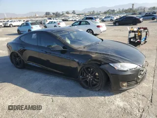 2014 Tesla Model S 60 с VIN 5YJSA1H16EFP40654, выставлен на аукционе Copart как лот 72070974 с пробегом Не указан миль и Списание • Salvage title. История ставок и продаж доступна на DreamBid. Изображение 4.
