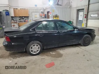 2002 Mitsubishi Galant ES z VIN 4A3AA46G32E114106, wystawiony jako Copart lot #64320224 z przebiegiem 119 403 mil mil oraz Szkody całkowita. Historia ofert i sprzedaży dostępna na DreamBid. Obrazek 3.