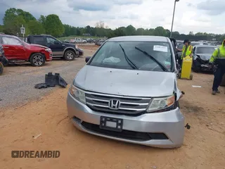 2013 Honda Odyssey LX with VIN 5FNRL5H27DB075559, listed as a IAAI auction lot 42007141 with Not Provided miles and . Bid and sale history available at carsss.com. Image 11.