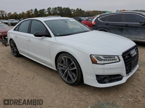 2017 Audi S8 z VIN WUAJ5AFD8HN901401, wystawiony jako Copart lot #77734973 z przebiegiem 133 780 mil mil oraz . Historia ofert i sprzedaży dostępna na DreamBid. Obrazek 4.
