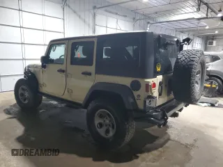 2012 Jeep Wrangler Unlimited Call of Duty MW3 with VIN 1C4BJWFGXCL105130, listed as a Copart auction lot 85747614 with 77,953 mi miles and Salvage title. Bid and sale history available at DreamBid. Image 2.