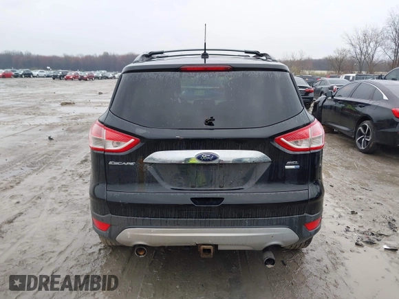 2013 Ford Escape SEL with VIN 1FMCU9H90DUA77972, listed as a IAAI auction lot 41984889 with 206,265 mi miles. Bid and sale history available at carsss.com. Image 16.