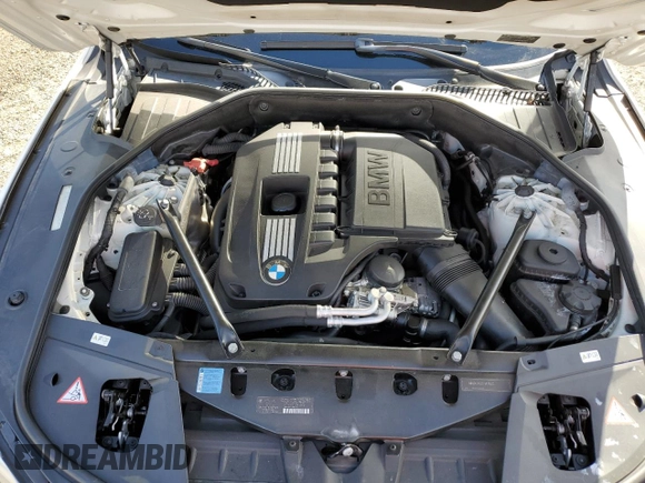 2011 BMW 7 Series 740Li with VIN WBAKB4C58BC573888, listed as a Copart auction lot 78736874 with 76,832 mi miles and Salvage Title. Bid and sale history available at DreamBid. Image 11.
