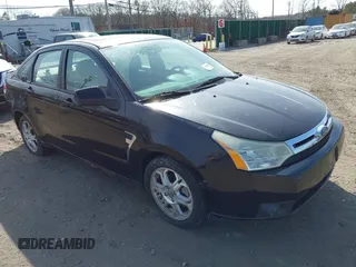 2008 Ford Focus SE with VIN 1FAHP35N68W278579, listed as a IAAI auction lot 41801538 with 999,999 mi miles. Bid and sale history available at carsss.com. Image 1.