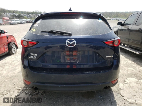 2020 Mazda CX-5 Grand Touring with VIN JM3KFBDM0L0767634, listed as a Copart auction lot 54433935 with 57,901 mi miles and Salvage Title. Bid and sale history available at carsss.com. Image 6.