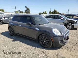 2017 MINI Hardtop Cooper S with VIN WMWXP7C30H2A46582, listed as a Copart auction lot 55466795 with 54,644 mi miles and Salvage title. Bid and sale history available at DreamBid. Image 4.