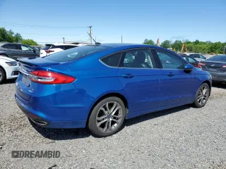 2017 Ford Fusion SE z VIN 3FA6P0T9XHR303675, wystawiony jako Copart lot #57134985 z przebiegiem 130 964 mil mil oraz Tytuł czysty. Historia ofert i sprzedaży dostępna na DreamBid. Obrazek 3.