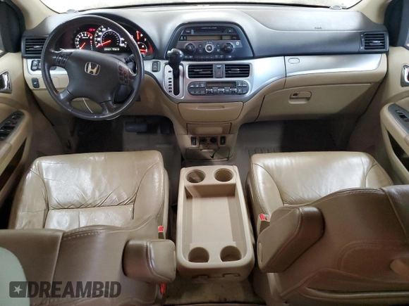 2010 Honda Odyssey EX-L with VIN 5FNRL3H65AB037699, listed as a Copart auction lot 53512905 with 234,337 mi miles and Salvage Title. Bid and sale history available at DreamBid. Image 8.