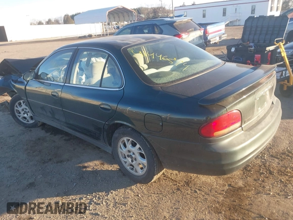 2001 Oldsmobile Intrigue GX z VIN 1G3WH52H11F127437, wystawiony jako IAAI lot #41446574 z przebiegiem Nie podano mil oraz . Historia ofert i sprzedaży dostępna na DreamBid. Obrazek 3.