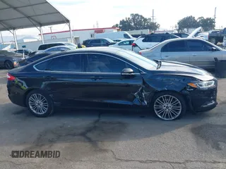 2014 Ford Fusion SE with VIN 3FA6P0HD4ER265241, listed as a IAAI auction lot 41473021 with 117,226 mi miles and . Bid and sale history available at DreamBid. Image 13.