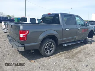 2018 Ford F-150 XL with VIN 1FTEW1CP2JFB50015, listed as a IAAI auction lot 41938177 with 248,137 mi miles and . Bid and sale history available at DreamBid. Image 4.