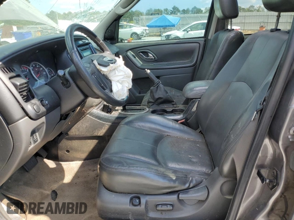 2006 Mazda Tribute S with VIN 4F2YZ06186KM08378, listed as a Copart auction lot 69391894 with Not Provided miles and Salvage Title. Bid and sale history available at DreamBid. Image 7.