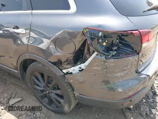 2015 Mazda CX-9 Grand Touring with VIN JM3TB3DA0F0459024, listed as a IAAI auction lot 42452288 with 174,716 mi miles and . Bid and sale history available at DreamBid. Image 6.