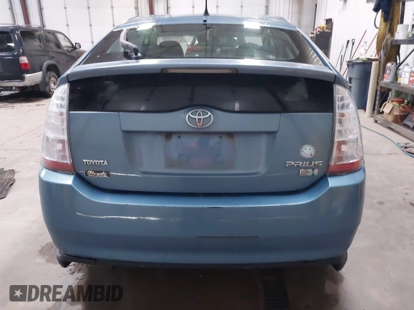 2007 Toyota Prius z VIN JTDKB20U477559103, wystawiony jako IAAI lot #41957891 z przebiegiem 285 452 mil mil oraz . Historia ofert i sprzedaży dostępna na DreamBid. Obrazek 13.